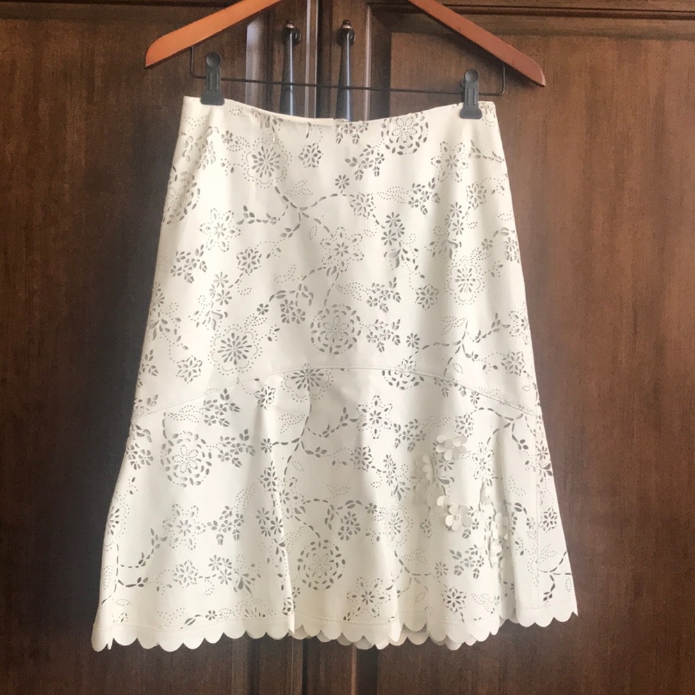 Wright’s white leather skirt